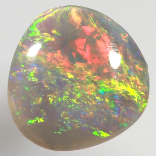 SOLID CRYSTAL OPAL Moving colour always, bright candy red over green and gold